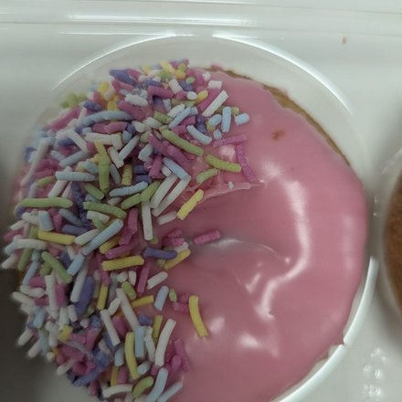 Pink sprinkle donut
