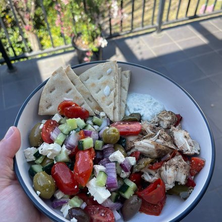 Greek bowl with chicken, salad and pita